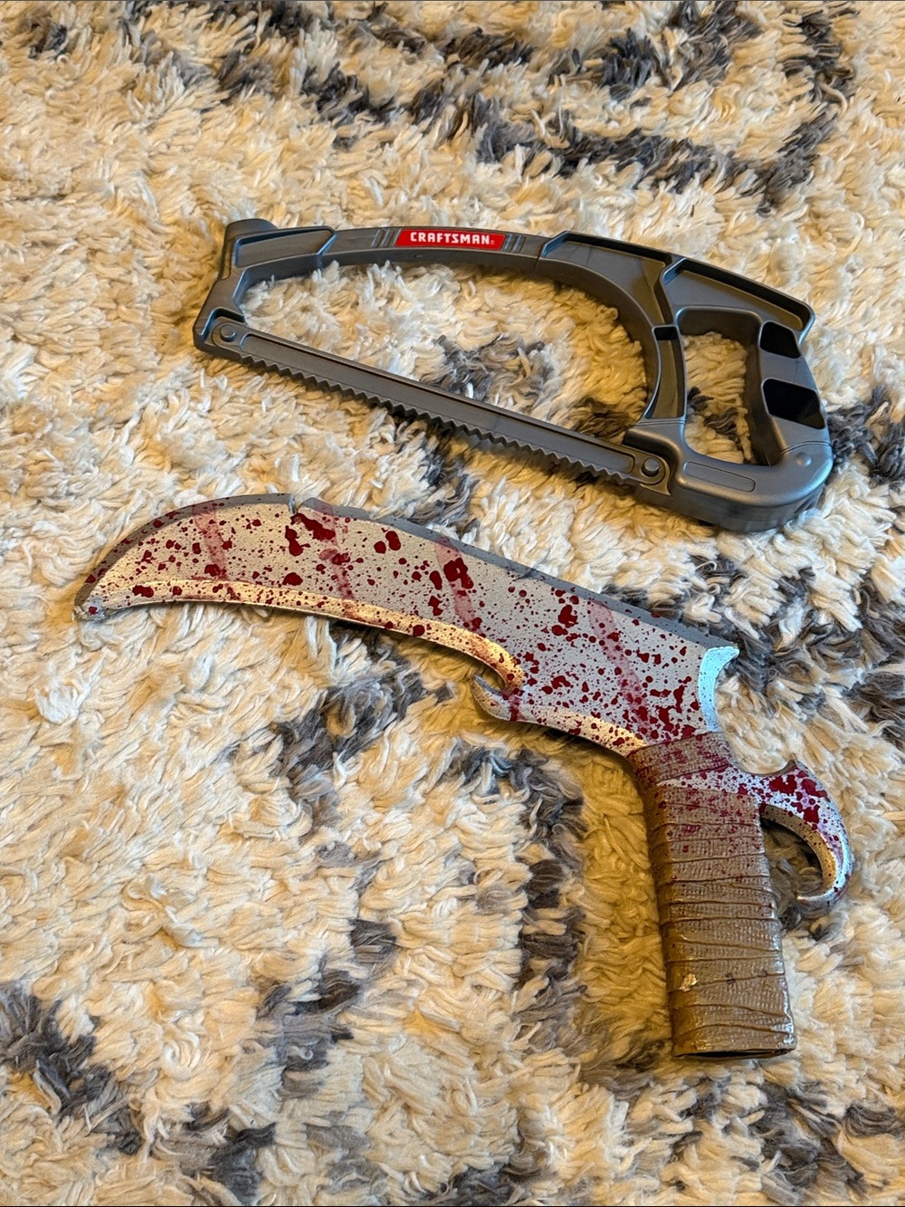 Craftsman Saw & Red-Speckled Silver and Brown Karambit Accent